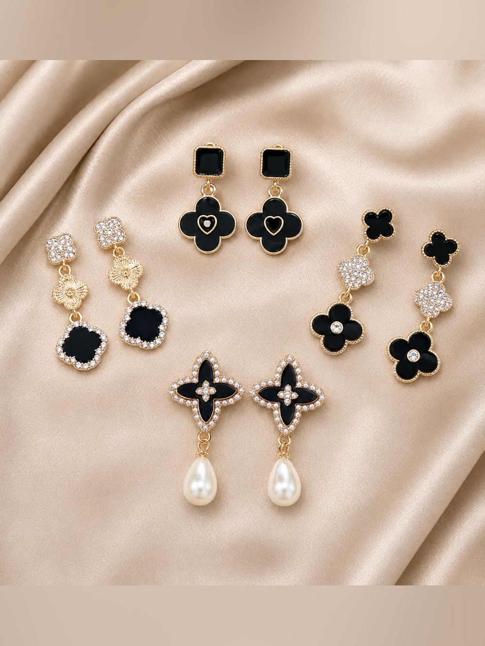 Black beauty alert Four sets of Black Clover Dangle Earrings - Gold Trim